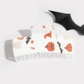 Detail of Halloween hair claw clip with orange pumpkin and black bat prints on white acrylic - White Pumpkin