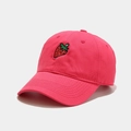 Close-up of pink baseball cap featuring detailed strawberry embroidery and cotton texture - Adjustable / Rose Red