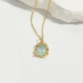 Detail of light blue gemstone pendant with gold wavy base and delicate chain necklace - Square Gold