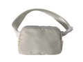 Waterproof nylon running waist bag in off-white with adjustable strap and buckle - White