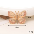 Detail shot of a 4x3cm rhinestone butterfly charm with pink crystals and 10.3g weight - D1199-Pink Butterfly