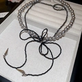 Detail of double-layer necklace with grey pearls, black crystal beads, and bow design - Double Layer Grey Pearl Bow Style (18#)