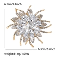 Golden sunburst flower brooch with clear crystals, 6.1cm by 6.3cm elegant floral pin - Gold White
