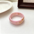 Minimalist wide resin bangle featuring pink marble texture and smooth finish - Retro Pink