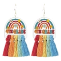 Close-up of rainbow flower earrings with 4th Grade text and colorful fringe tassels - 4th Grade
