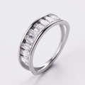 Detailed view of silver ring featuring channel-set baguette-cut sparkling crystals - Size 6 / Steel