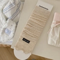 Beige ribbed knit leg warmers with delicate ruffle trim and elastic cotton fabric - One Size / Oatmeal