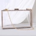 Transparent acrylic box clutch bag with gold metal frame and stylish chain strap - Clear