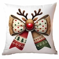 White Christmas pillow cover with reindeer antlers and festive patterned bow design - Christmas Bow Reindeer