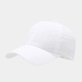 Close-up of laser-cut breathable holes on white quick-dry sports baseball cap fabric - Adjustable / White