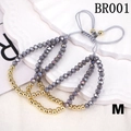 Detail of three adjustable braided bracelets with grey crystal beads and gold metal accents - One Size / Dark Gray