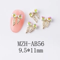 Détail du bijou d'ongle nœud doré 9,5x11mm avec strass cœur AB sur ongle rose modèle - Nœud Aurore Rose Vert (AB56)