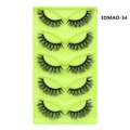 Detailed view of 5 pairs of thick black cat-eye false eyelashes on a green tray - 3D Dense Cross Elongated Style (3DMAO-34)