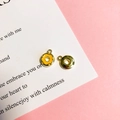 Dettaglio di ciondoli a forma di ciambella dorata con smalto giallo per gioielli fai-da-te - 1# Ciambella all'Arancia Oro