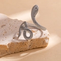 Macro detail of silver snake-shaped 304 stainless steel ring with textured scale patterns - Steel Color Style 9