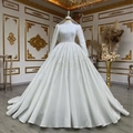 Luxury long sleeve wedding dress with pearl beaded embroidery and voluminous ball gown skirt - US 4 / White