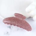 Pink glitter acrylic shark hair clip with teeth design on white marble background - Rouge Red