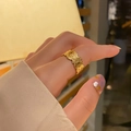 Close-up of golden feather texture on adjustable stainless steel ring with natural veins - KTG036J-Fine Feather Texture Style