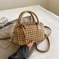 Golden woven Boston pillow handbag with top handles and adjustable shoulder strap - Brown