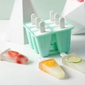 Turquoise 6-cell silicone popsicle mold with fruit-filled ice pops on white background - Popsicle Mold 6-Grid Green