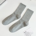 Light grey ribbed cotton mid-calf socks with elastic cuffs on a minimalist white surface - One Size / Light Gray