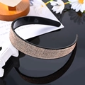 Sparkling gold rhinestone padded headband with a sleek black base for women - Champagne Full Rhinestone Solid