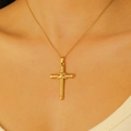 Close-up of minimalist 18k gold-plated stainless steel cross necklace worn by a model - 18K Real Gold 2340 Gold Vintage Twisted Cross Necklace