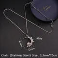 Silver crescent moon skull necklace with meteorite texture on a stainless steel chain - Crescent Moon Skull