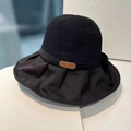 Black wide-brim sun hat with straw crown and fabric brim featuring a leather tag - Black Leather Label