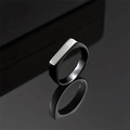 Close-up of a minimalist silver signet ring with a flat rectangular surface and a polished finish - US 6 / Black