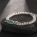 Silver Cuban chain bracelet featuring a green striped malachite stone on volcanic rock - Bracelet / Dark Green