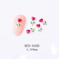 Detalle macro de dijes para uñas de rosa 4,3x9 mm con tallos dorados y pétalos rosas - Rosa Roja Rosa (8400)