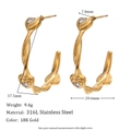 Twisted hoop earrings in 18K gold plated stainless steel with heart zircon accents - Twisted Heart Zirconia Hoop Earrings - Gold