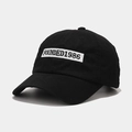 Detail of founded 1986 embroidery on black cotton twill baseball cap with curved brim - Adjustable / Black