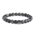 Macro detail of 8mm grey natural stone beads and textured metal cylinder on men's bracelet - Larvikite