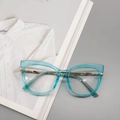 Occhiali cat-eye con montatura blu turchese trasparente e stanghette in metallo oro - Blu Trasparente