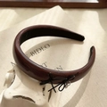 Vintage brown leather headband with black metal bow and logo charm decoration - Black Bow