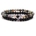 Close-up of 8mm distance bead bracelets set with natural stone and matte black finish - India Agate