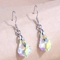 Iridescent maple leaf crystal drop earrings with silver hooks on textured background - AB Color