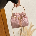Sparkling pink rhinestone bucket bag with golden metal handle and fringe tassel detail - Pink