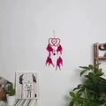 Pink heart-shaped dream catcher with feathers and beads on a white wall decor - Rose Red Double Heart