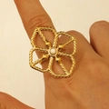 Close-up of golden hollow flower ring with white stone center and rope texture detail - Pearl Hollow Flower (A-742)