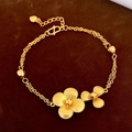 Elegante bracciale dorato con catene a doppio strato e ciondoli a fiori a quattro petali - Stile Regolabile Cuore Fiore a Quattro Petali Doppia Catena Oro (43#)