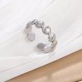 Minimalist silver shell-shaped stainless steel open ring on elegant white silk fabric - Linked Shells (JR1034-S7)