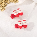 Dettaglio di 2 fermagli natalizi con Babbo Natale in resina e nastro di tessuto rosso - Stile Babbo Natale-Rosso 2 Pezzi
