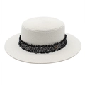 Detailed texture of white boater straw hat with tweed ribbon and gold M logo - M (56-58cm) / White