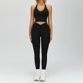 Two-piece black yoga set featuring V-neck sports bra and crossover waist leggings - L / Top And Bottom / Premium Black