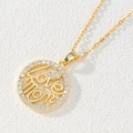 Macro view of gold love mom circular pendant with sparkling cubic zirconia setting - Round Love Mom/Heart/White Zirconia