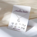 Parure bijoux argentée avec collier lune étoile et boucles d'oreilles en strass - Carte Blanche-Collier Lune Étoile Argenté et 4 Paires de Boucles d'Oreilles (Cœur/Flocon/Nœud)
