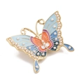 Elegant gold butterfly brooch with blue enamel wings and inlaid white pearls - Style 10/Light Blue Pearl